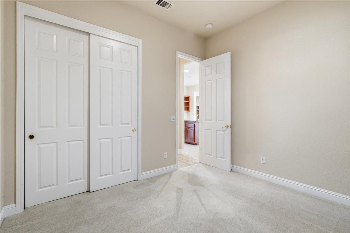 4129 Poppleton Way Carmichael, CA 95608 - Photo 22 of 48 an empty room with windows