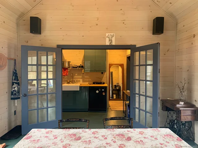 a bathroom with a sink vanity and a mirror