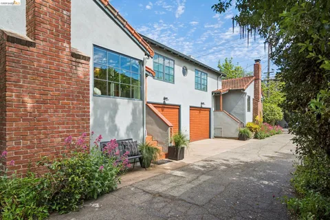 a front view of a house with garage