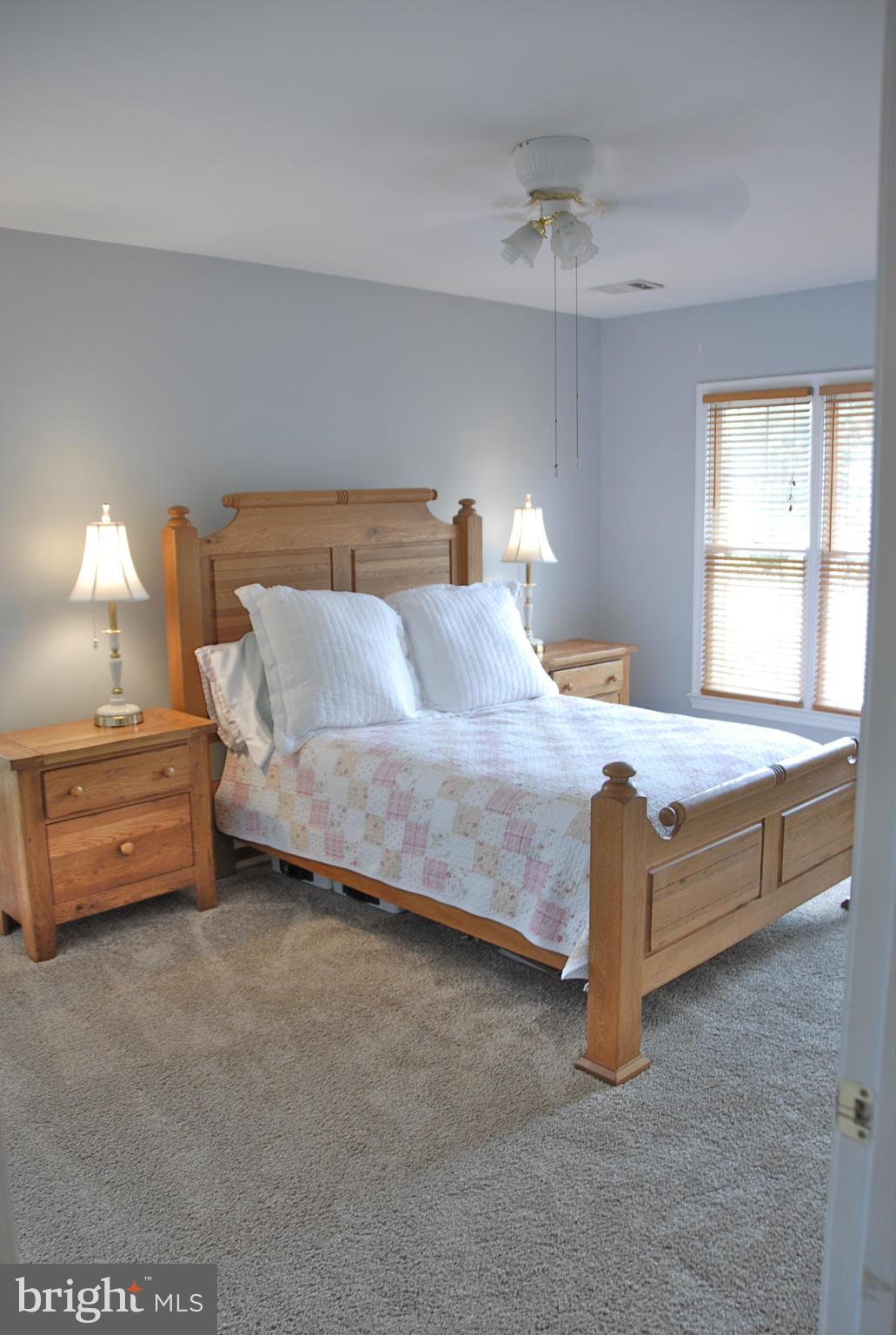 1273 Weatherstone Court Reston, VA 20194 - Photo 13 of 24 a bedroom with bed and window