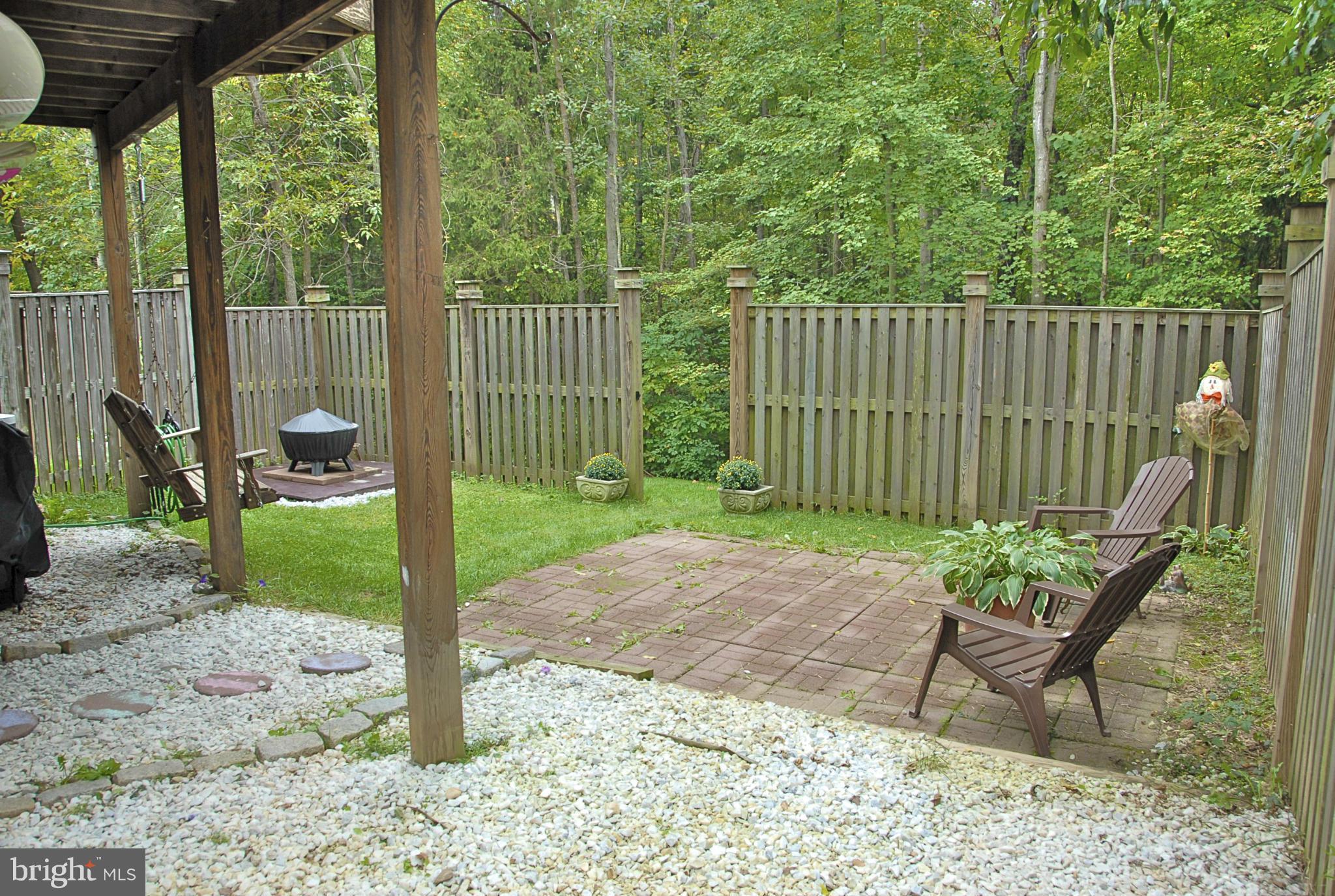 1273 Weatherstone Court Reston, VA 20194 - Photo 21 of 24 a garden view with a seating space