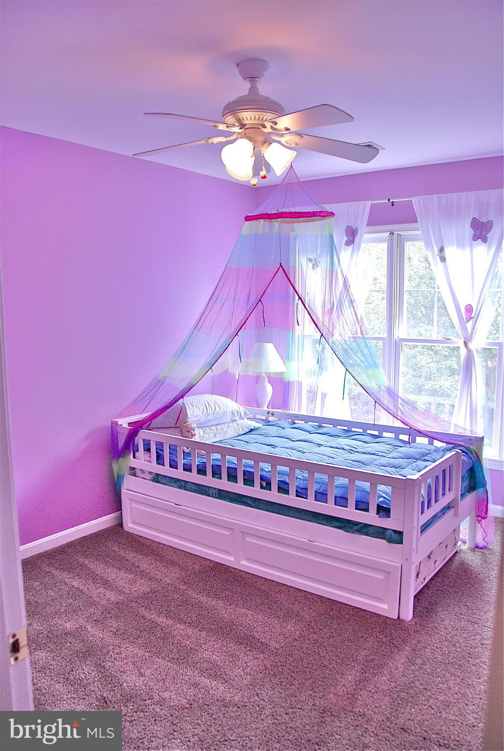 1273 Weatherstone Court Reston, VA 20194 - Photo 10 of 24 a view of a room with a chandelier and a window
