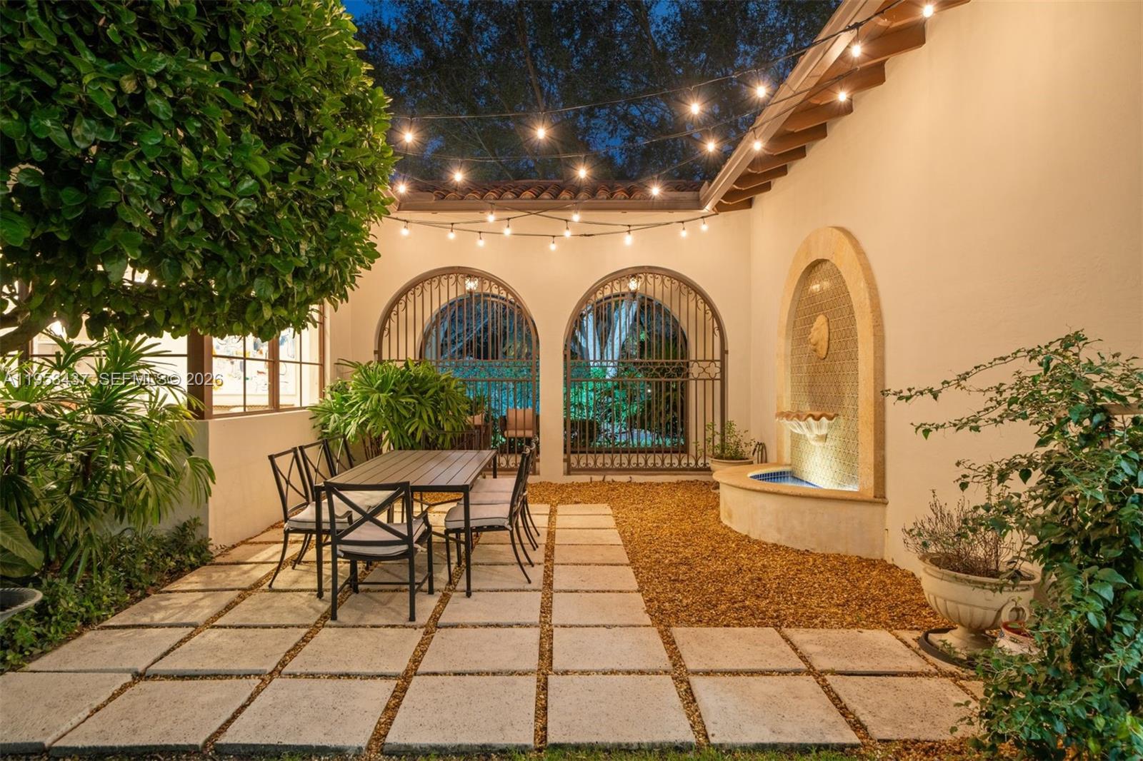 5865 Southwest 96th Street Pinecrest, FL 33156 - Photo 17 of 32 a view of a chairs and tables in the patio