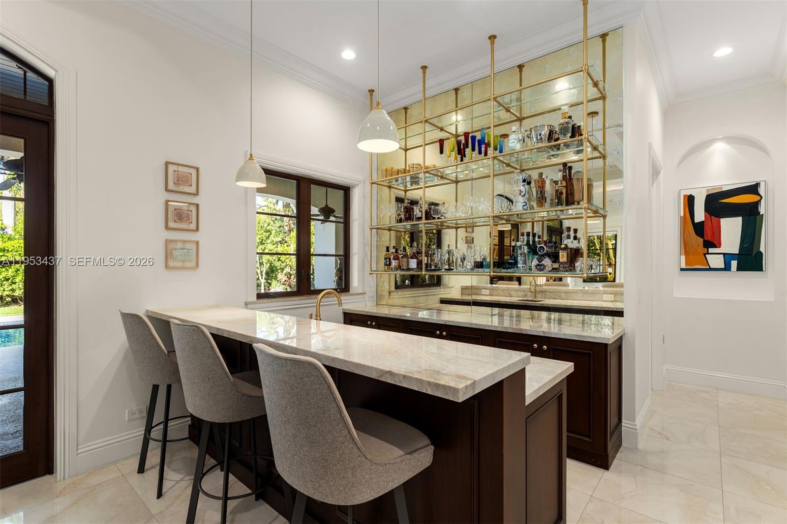 5865 Southwest 96th Street Pinecrest, FL 33156 - Photo 22 of 32 a dining area with a table and chairs in it