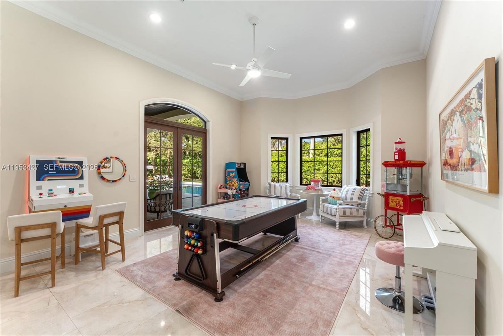 5865 Southwest 96th Street Pinecrest, FL 33156 - Photo 23 of 32 a bedroom with furniture and a window