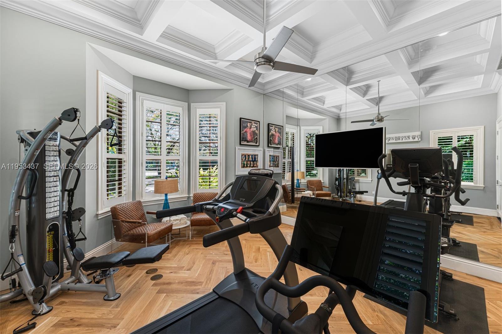 5865 Southwest 96th Street Pinecrest, FL 33156 - Photo 24 of 32 a view of a livingroom with workspace and a window