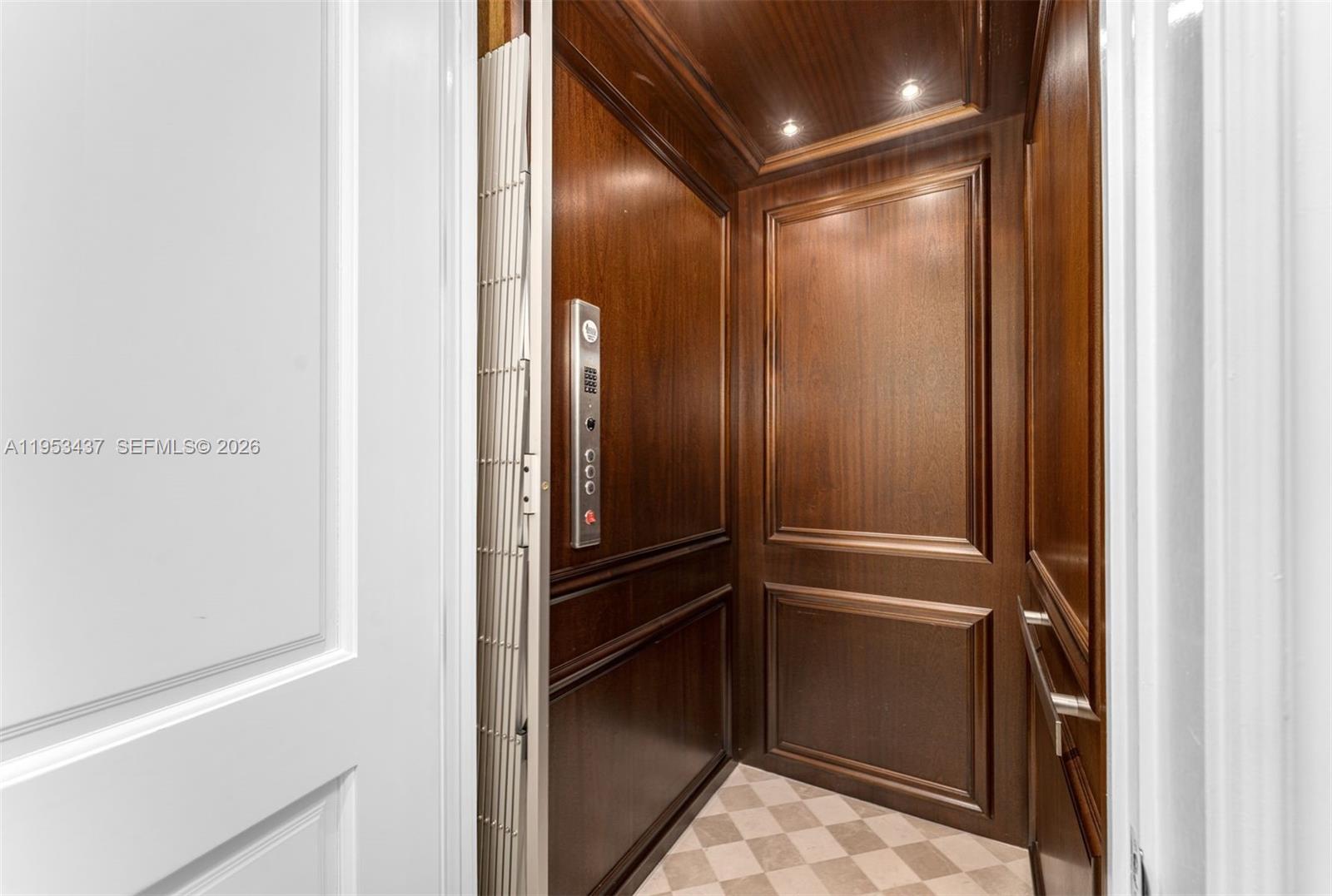 5865 Southwest 96th Street Pinecrest, FL 33156 - Photo 25 of 32 a bathroom with a glass shower door