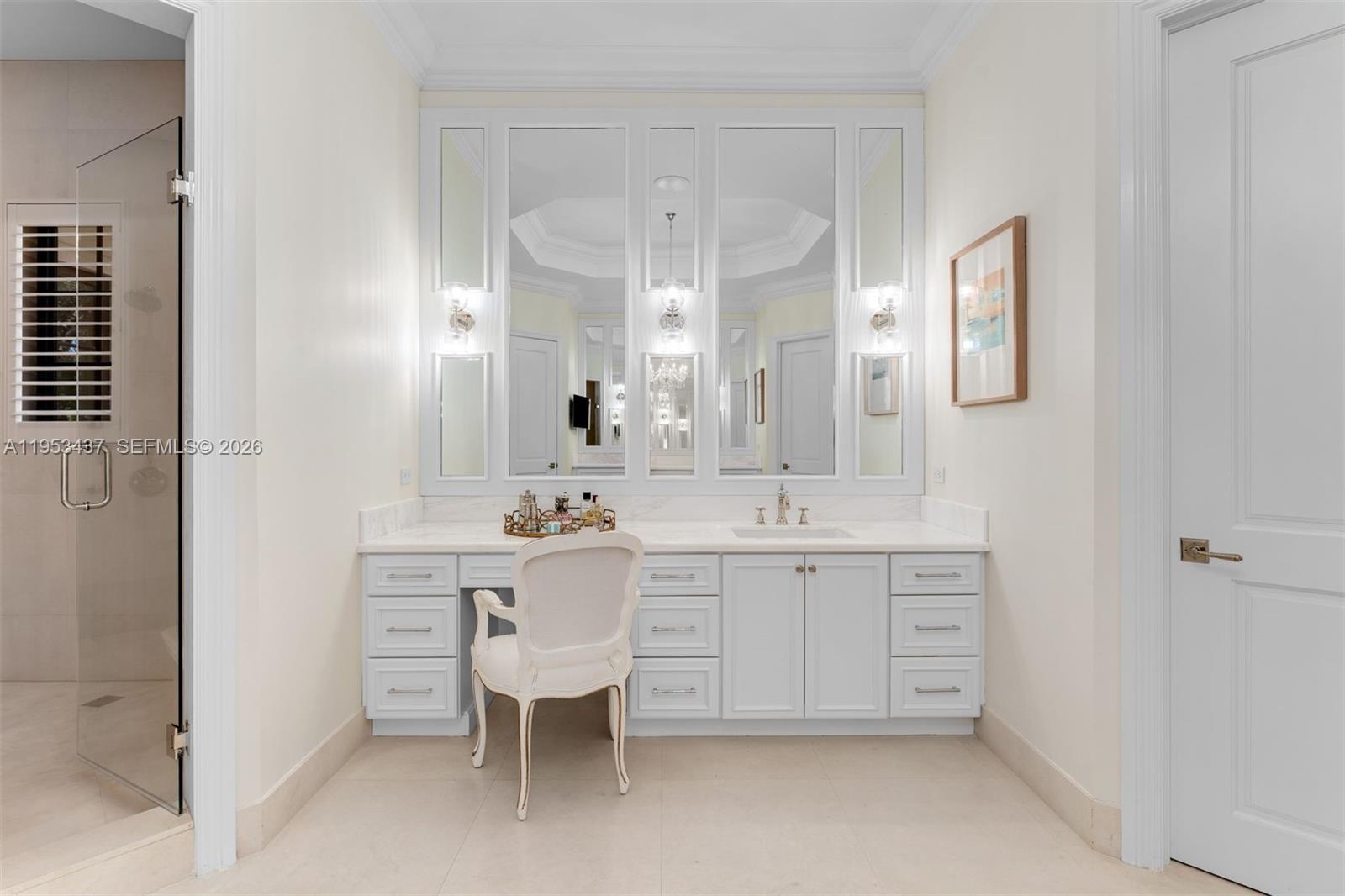 5865 Southwest 96th Street Pinecrest, FL 33156 - Photo 10 of 32 a spacious bathroom with a double vanity sink and a mirror