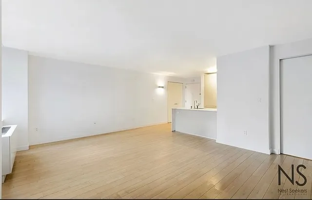 a bathroom with a bathtub and a sink