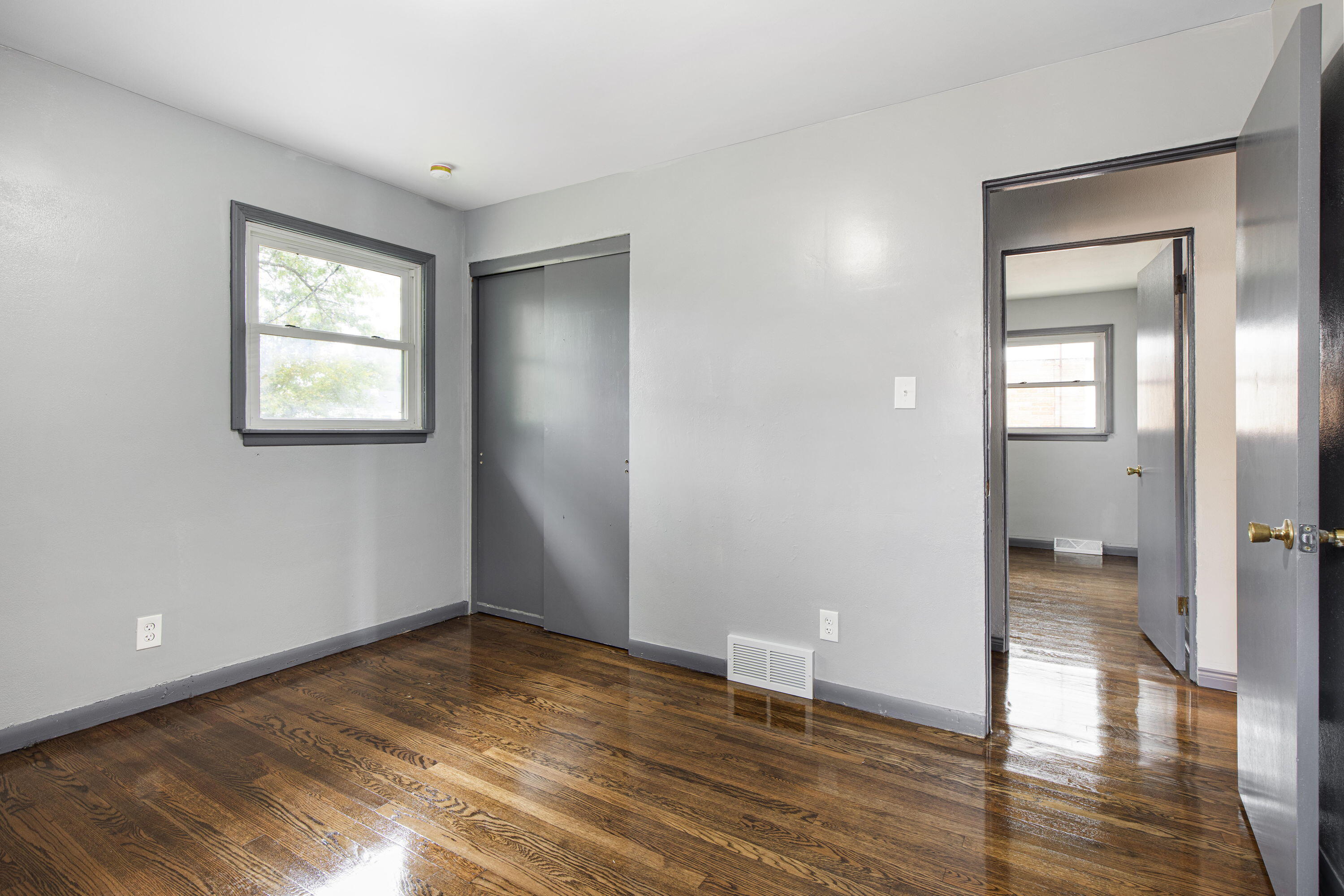 4216 East 13th Avenue Gary, IN 46403 - Photo 9 of 18 wooden floor in an empty room