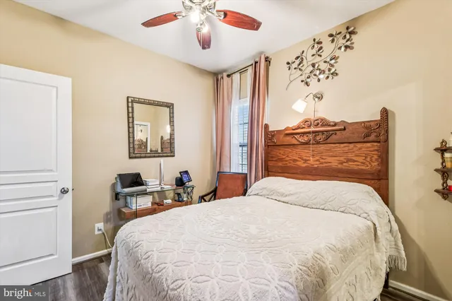 a view of an entryway with wooden floor and stairs
