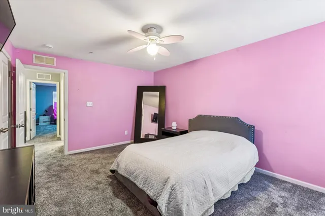 a house view with a sitting space and garden