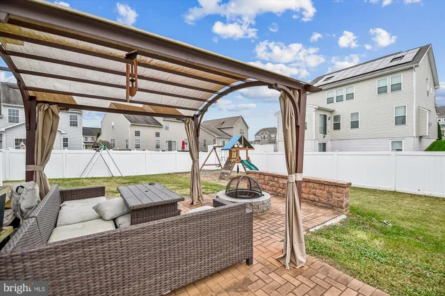 a view of a park with a large trees