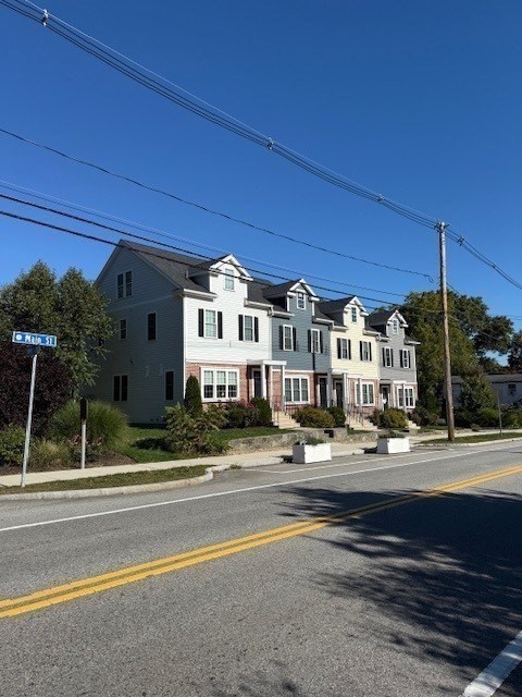 176 Main Street, Unit 3 Medway, MA 02053 - Photo 5 of 26 a view of city with tall buildings
