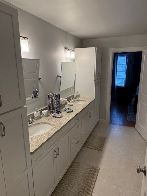 176 Main Street, Unit 3 Medway, MA 02053 - Photo 9 of 26 a bathroom with a double vanity sink and a mirror