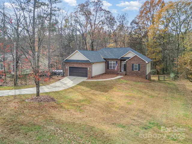 a house with trees in the background
