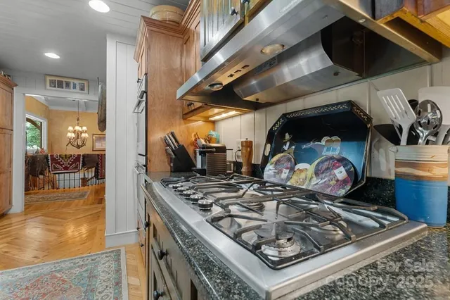 a view of a dining room with furniture and window