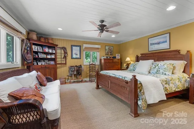 a bathroom with a sink a mirror and a shower