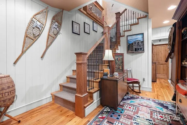 a living room with furniture a ceiling fan and a window