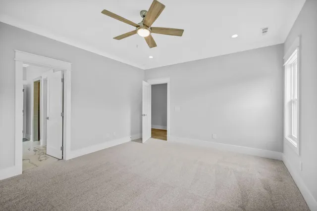 a view of an empty room with a window