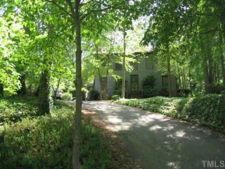 3001 Upland Circle Raleigh, NC 27607 - Photo 1 of 1 Secluded artful home at end of cul-de-sac with wide plank pine floors, spawling living & family rms, bright white kitchen, master bedr down, 2 additional large bedr, 33x16+ unf area to expand into, mature shrubs. Original owner. Exterior Front