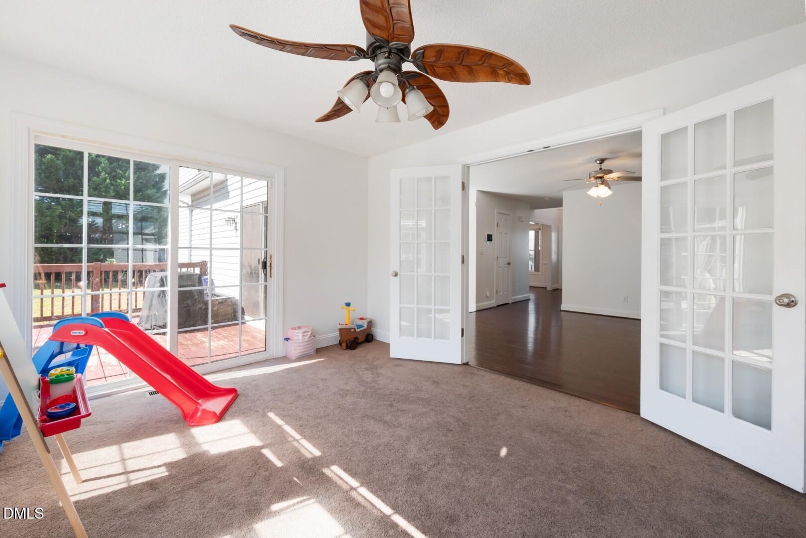 66 Snowden Lane Cameron, NC 28326 - Photo 12 of 55 a view of an empty room with windows