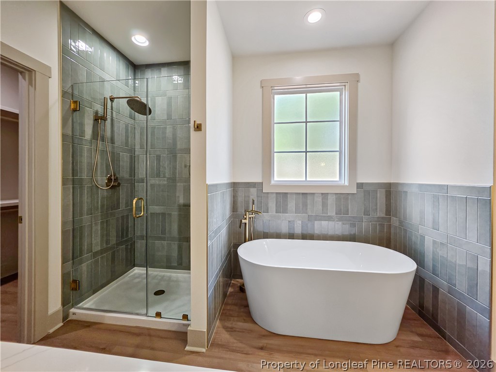 900 Niagara Carthage Road Carthage, NC 28327 - Photo 12 of 38 a bathroom with a bathtub and shower