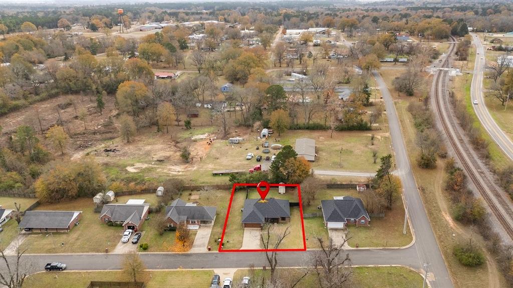 202 Spring Valley Queen City, TX 75572 - Photo 30 of 35 Aerial view of property and surrounding area with property boundaries highlighted