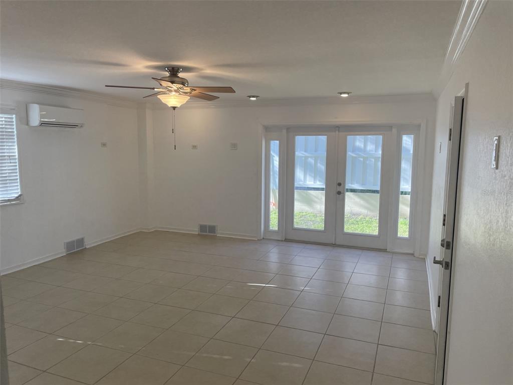 136 175th Avenue East Redington Shores, FL 33708 - Photo 29 of 40 a view of an empty room with a window