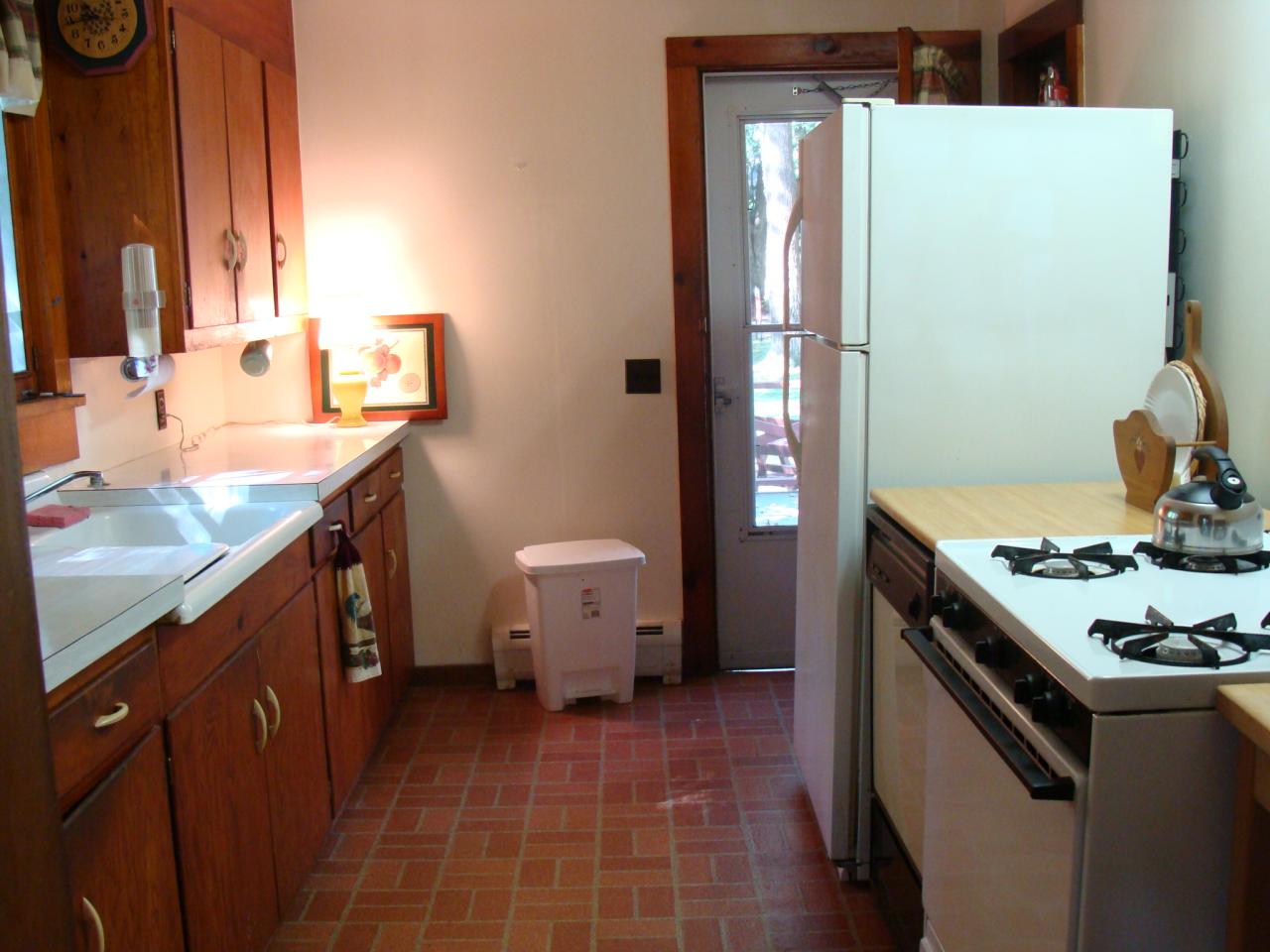 4 Grove Road Stockbridge, MA 01262 - Photo 11 of 16 a kitchen with a sink stove and refrigerator