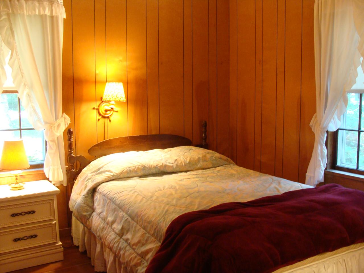 4 Grove Road Stockbridge, MA 01262 - Photo 12 of 16 a bedroom with a bed and a window