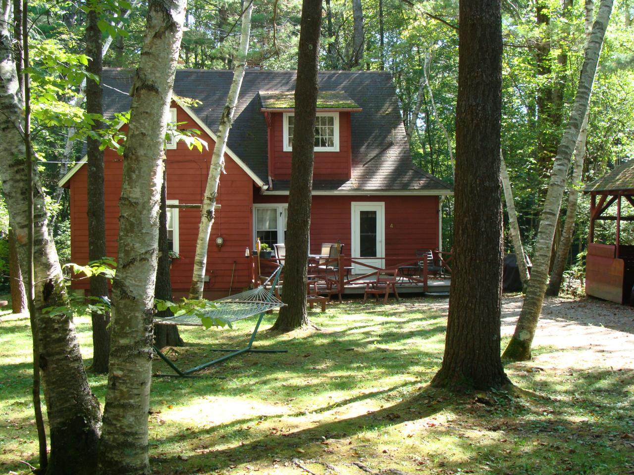 4 Grove Road Stockbridge, MA 01262 - Photo 16 of 16 a view of a house with backyard