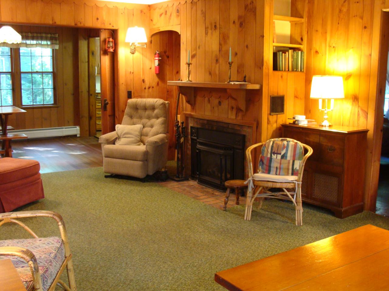 4 Grove Road Stockbridge, MA 01262 - Photo 8 of 16 a living room with furniture and a fireplace