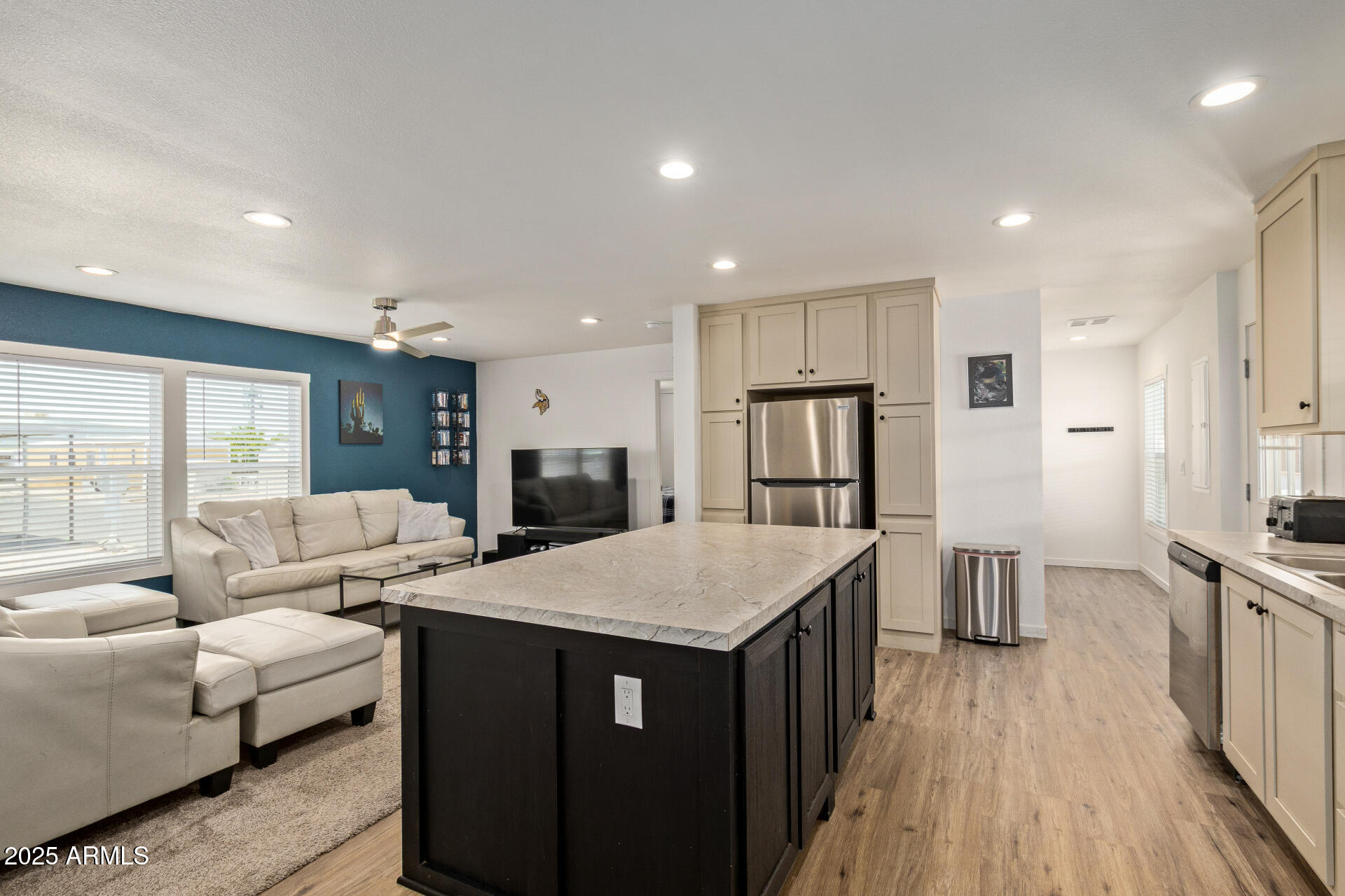 501 East Ray Road, Unit 201 Chandler, AZ 85225 - Photo 2 of 28 a open kitchen with stainless steel appliances granite countertop a refrigerator and a stove top oven