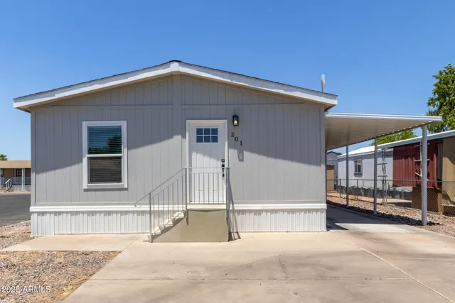 a front view of a house with a glass door