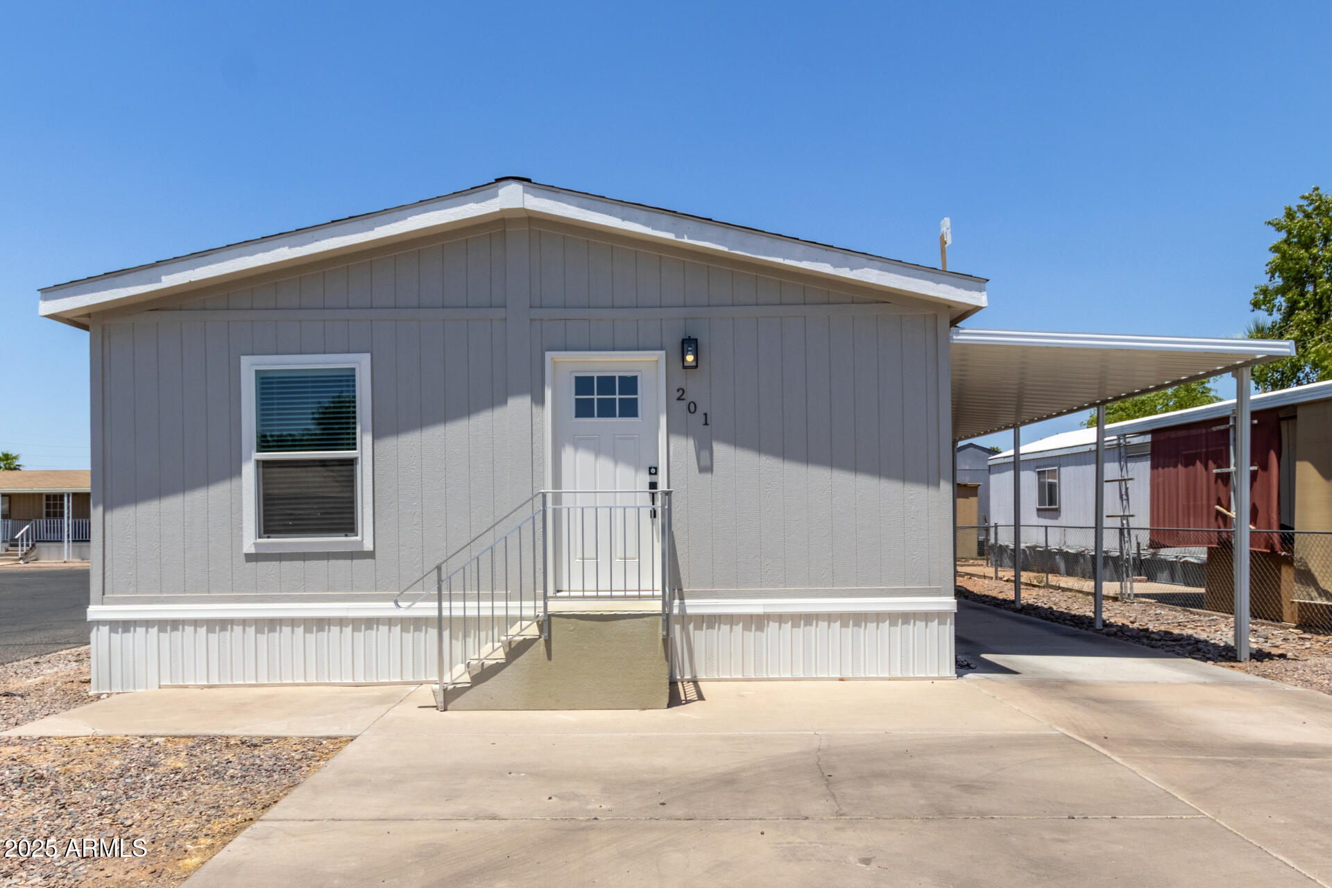 501 East Ray Road, Unit 201 Chandler, AZ 85225 - Photo 20 of 28 a house with a outdoor view