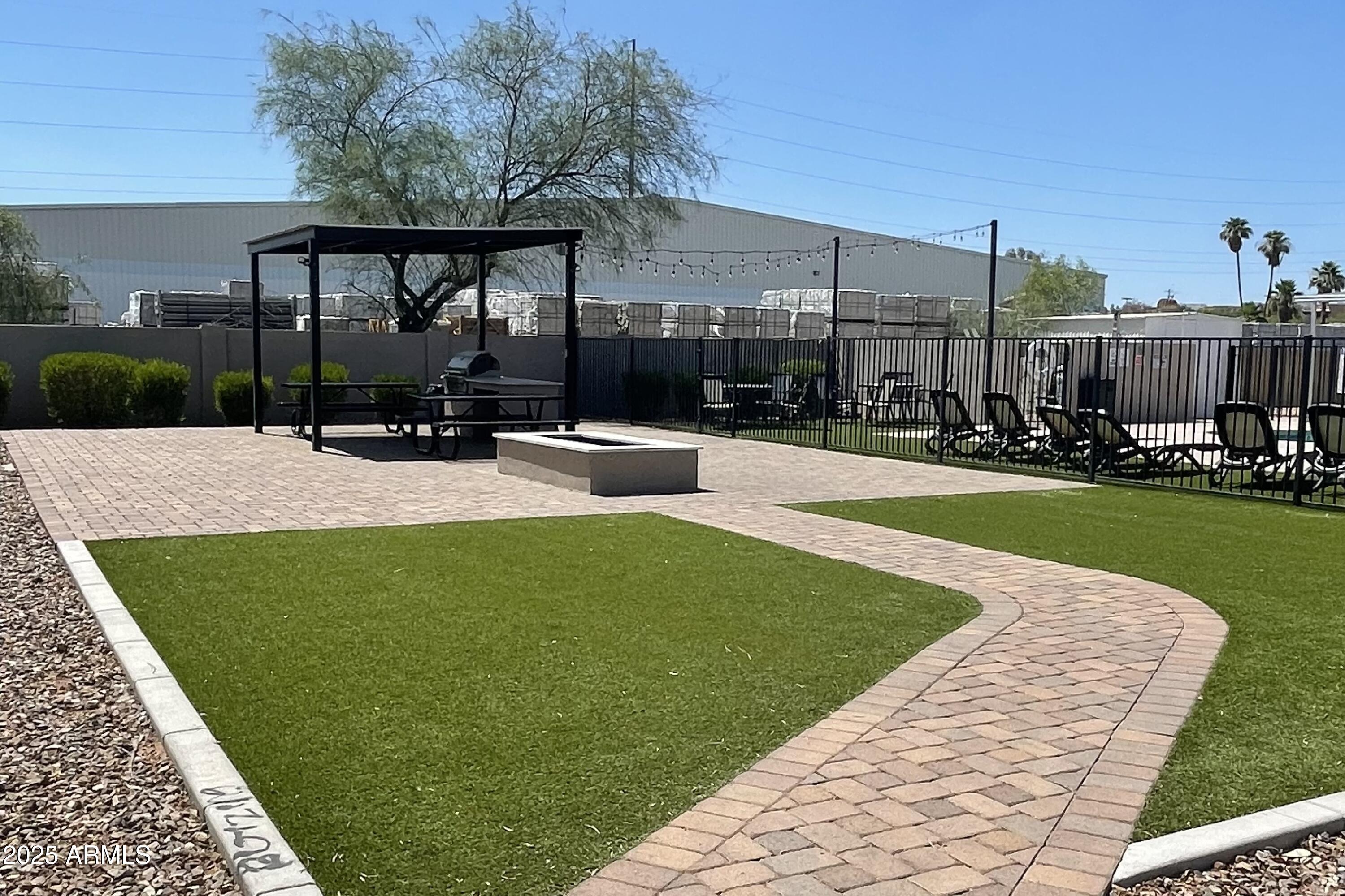 501 East Ray Road, Unit 201 Chandler, AZ 85225 - Photo 23 of 28 a view of a backyard