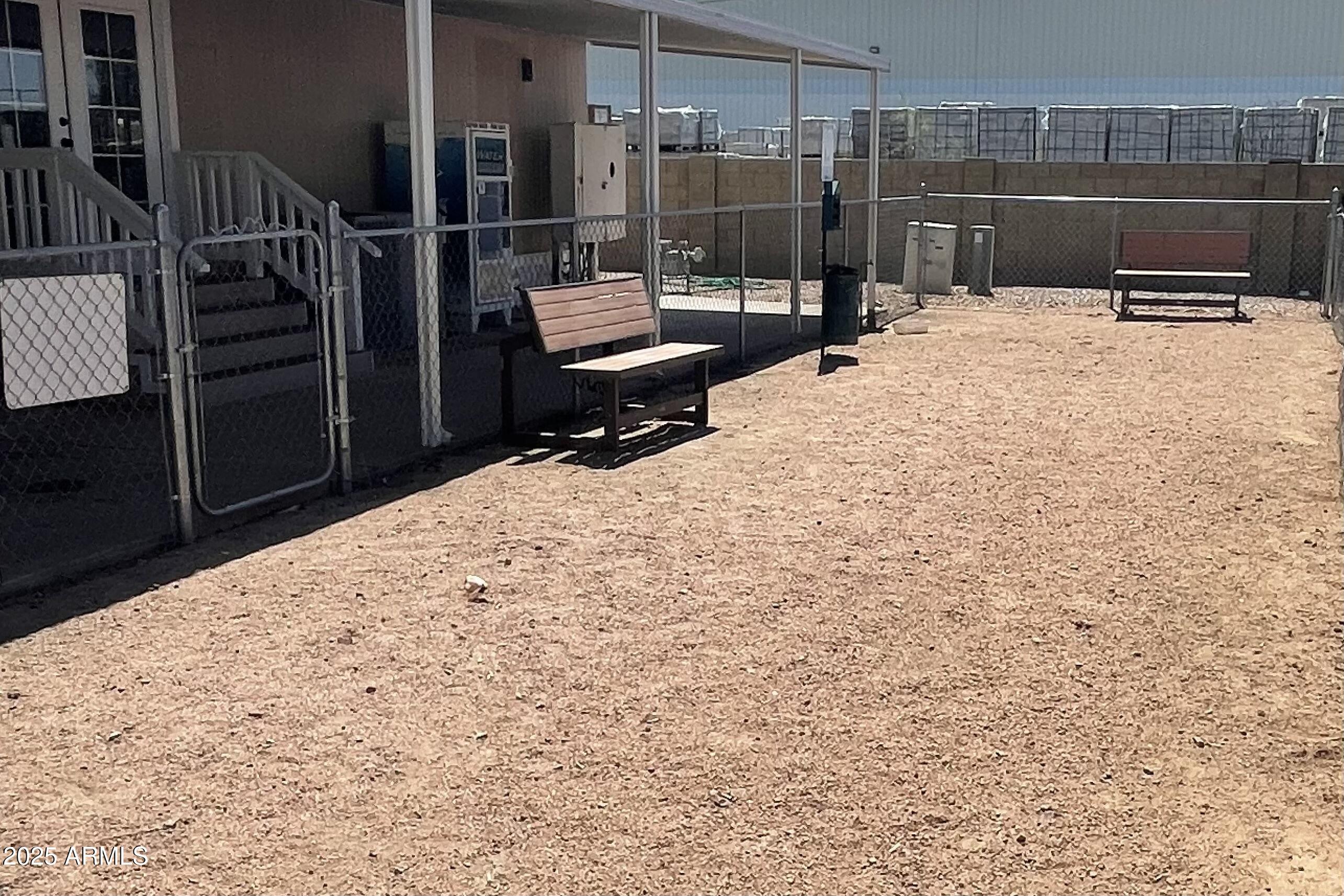 501 East Ray Road, Unit 201 Chandler, AZ 85225 - Photo 26 of 28 a backyard of a house with barbeque oven and outdoor seating