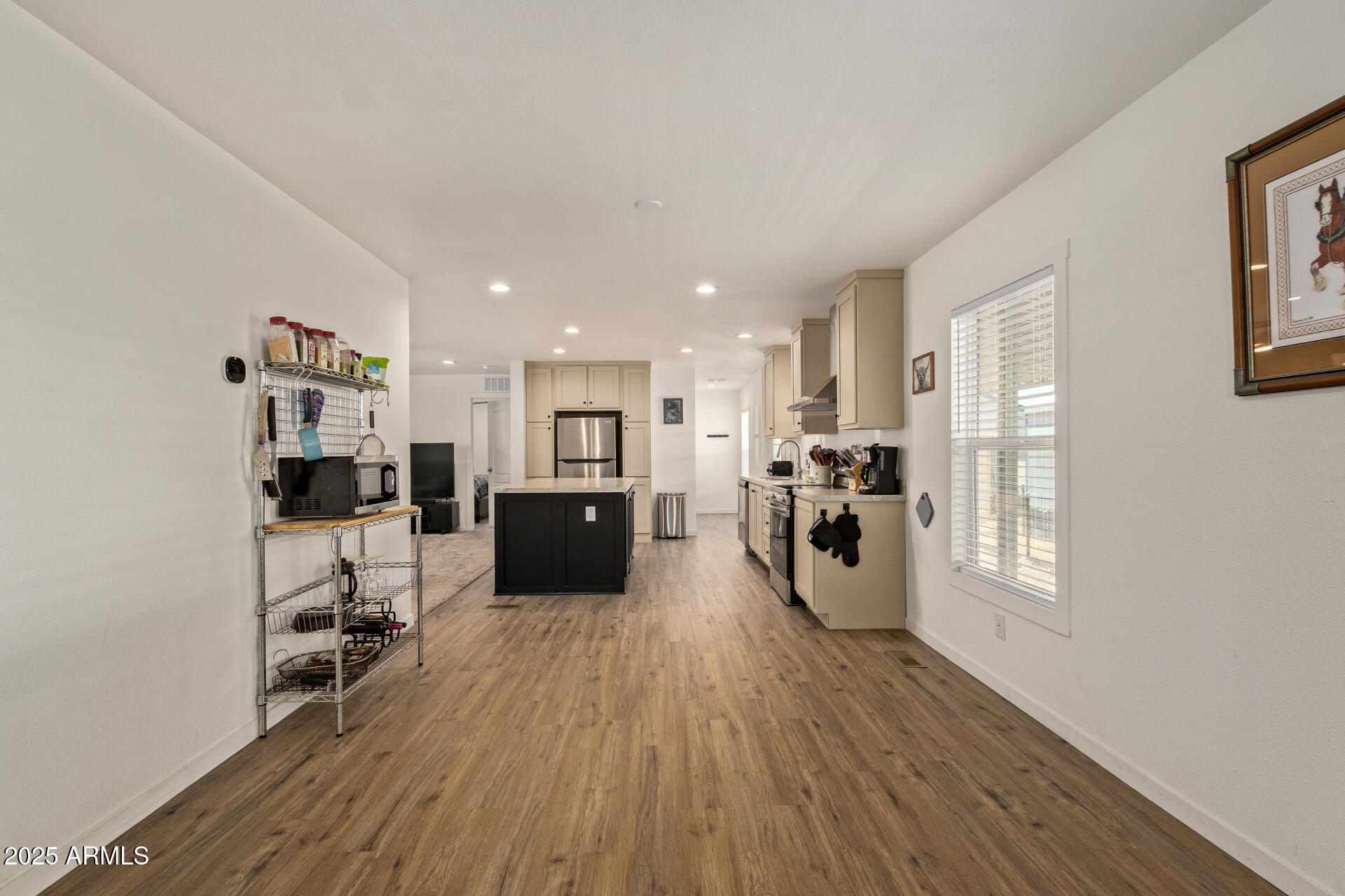 501 East Ray Road, Unit 201 Chandler, AZ 85225 - Photo 6 of 28 a living room with furniture and a wooden floor