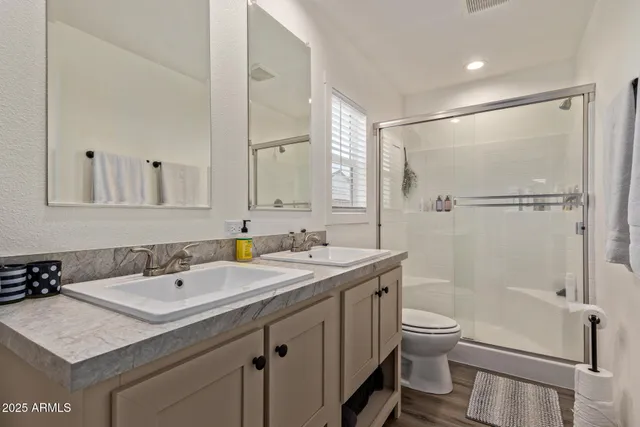 a view of a livingroom with furniture and windows
