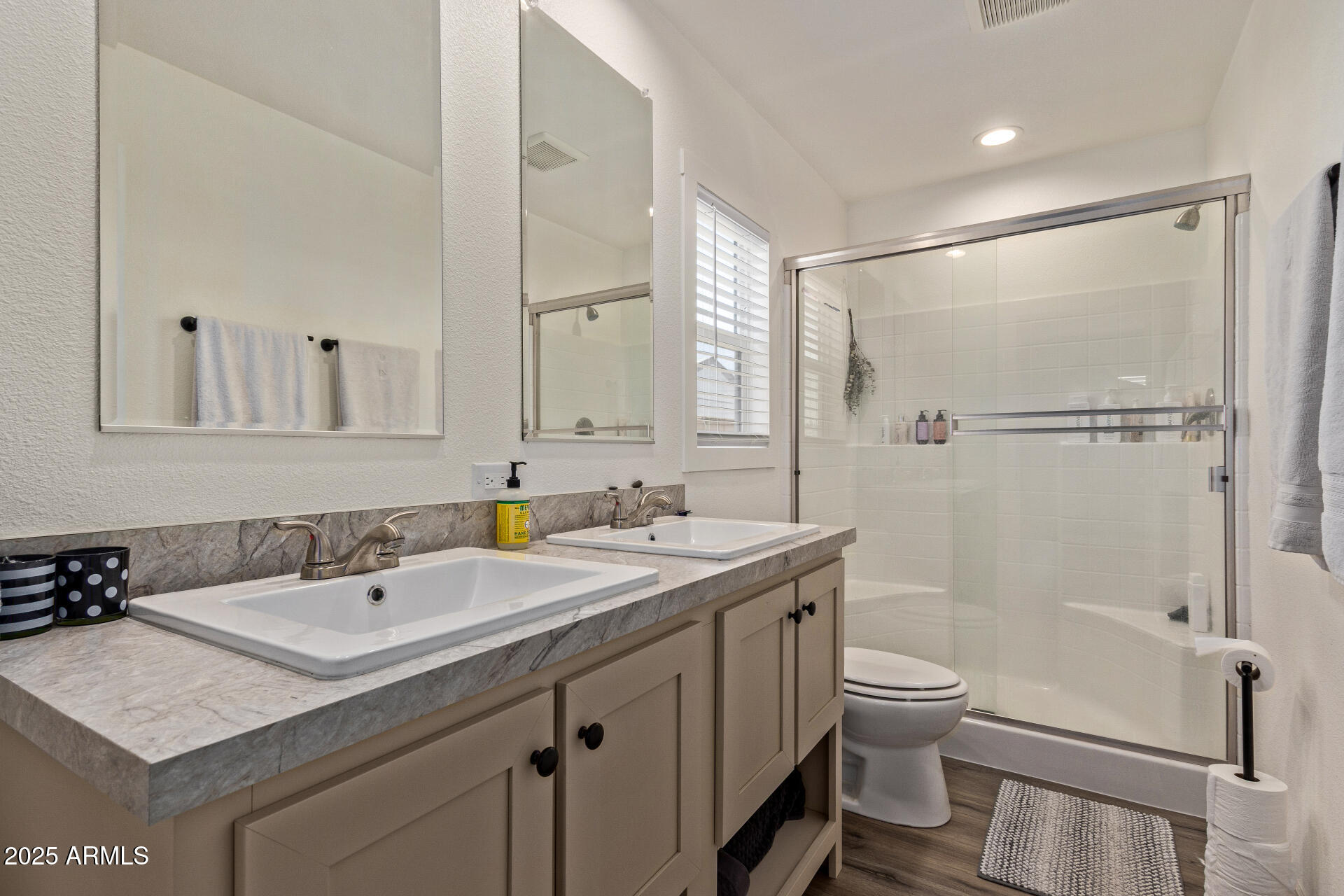 501 East Ray Road, Unit 201 Chandler, AZ 85225 - Photo 9 of 28 a bathroom with a sink toilet and shower