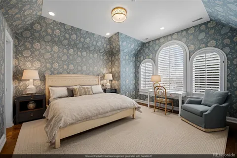 a spacious bedroom with a bed and a couch