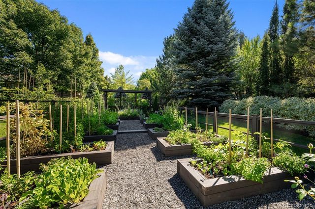 a view of a garden with a patio