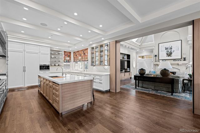 a bath tub sitting in a bathroom next to a window