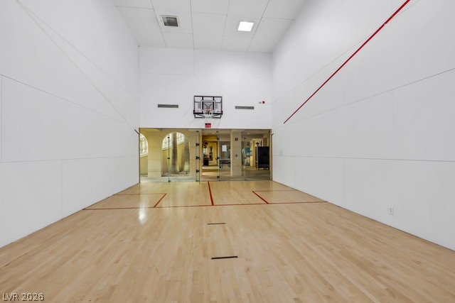 230 East Flamingo Road, Unit 435 Las Vegas, NV 89169 - Photo 12 of 15 An indoor sports court with hardwood flooring and ample space awaits your active pursuits.