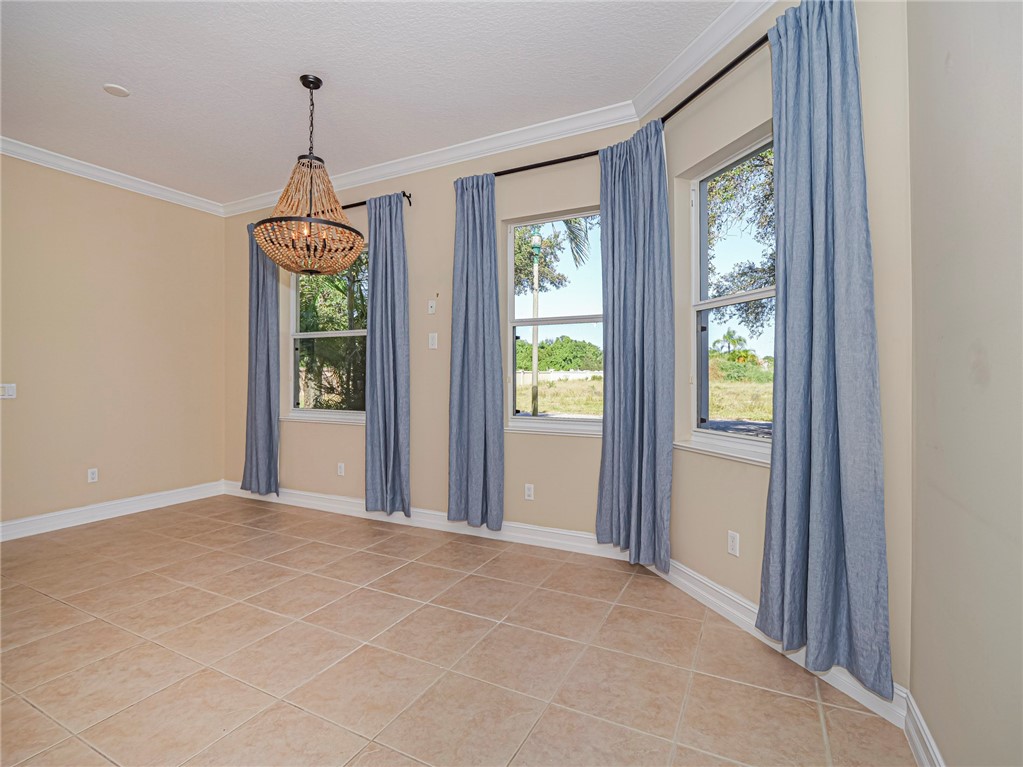 1965 Bridgepointe Circle, Unit 84 Vero Beach, FL 32967 - Photo 12 of 33 a view of livingroom with window