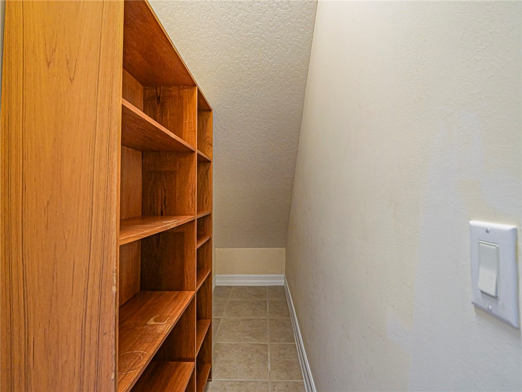 1965 Bridgepointe Circle, Unit 84 Vero Beach, FL 32967 - Photo 15 of 33 a view of walk in closet