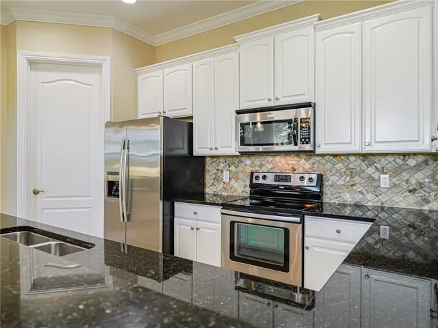 a view of a chandelier in a room