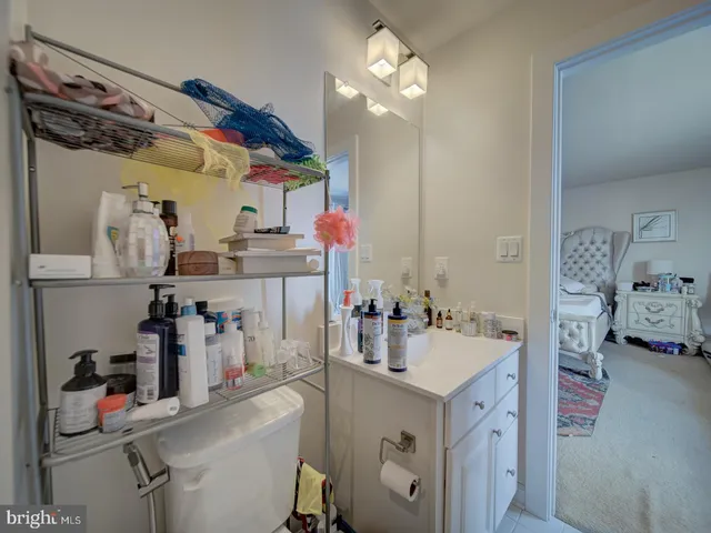 a kitchen with sink cabinets and appliances