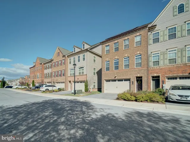 a city view with tall buildings and a street light